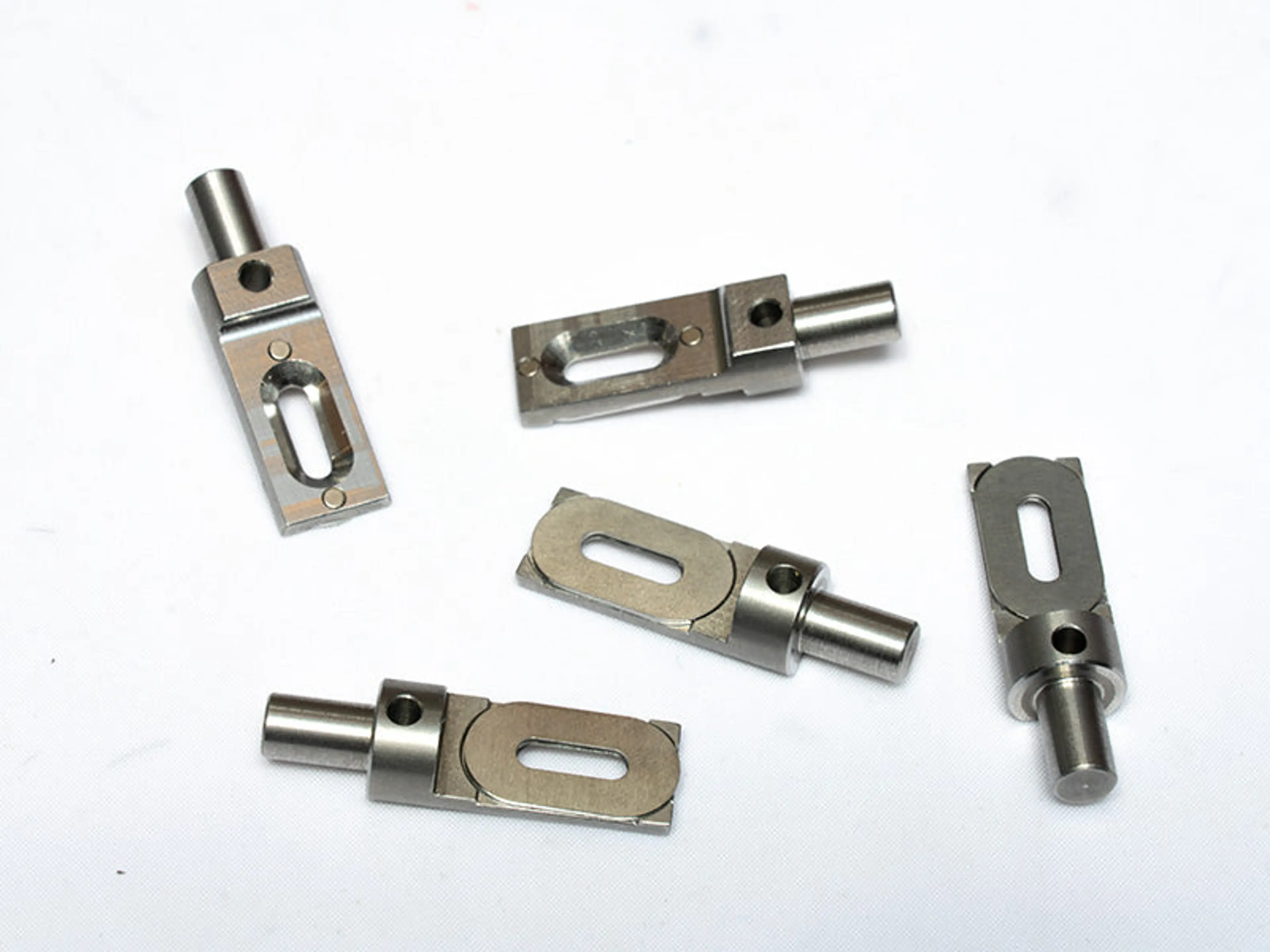 SET OF FOIL TRANSMISSION HOLDERS FOR CAPILLARY SPINNER STAGE