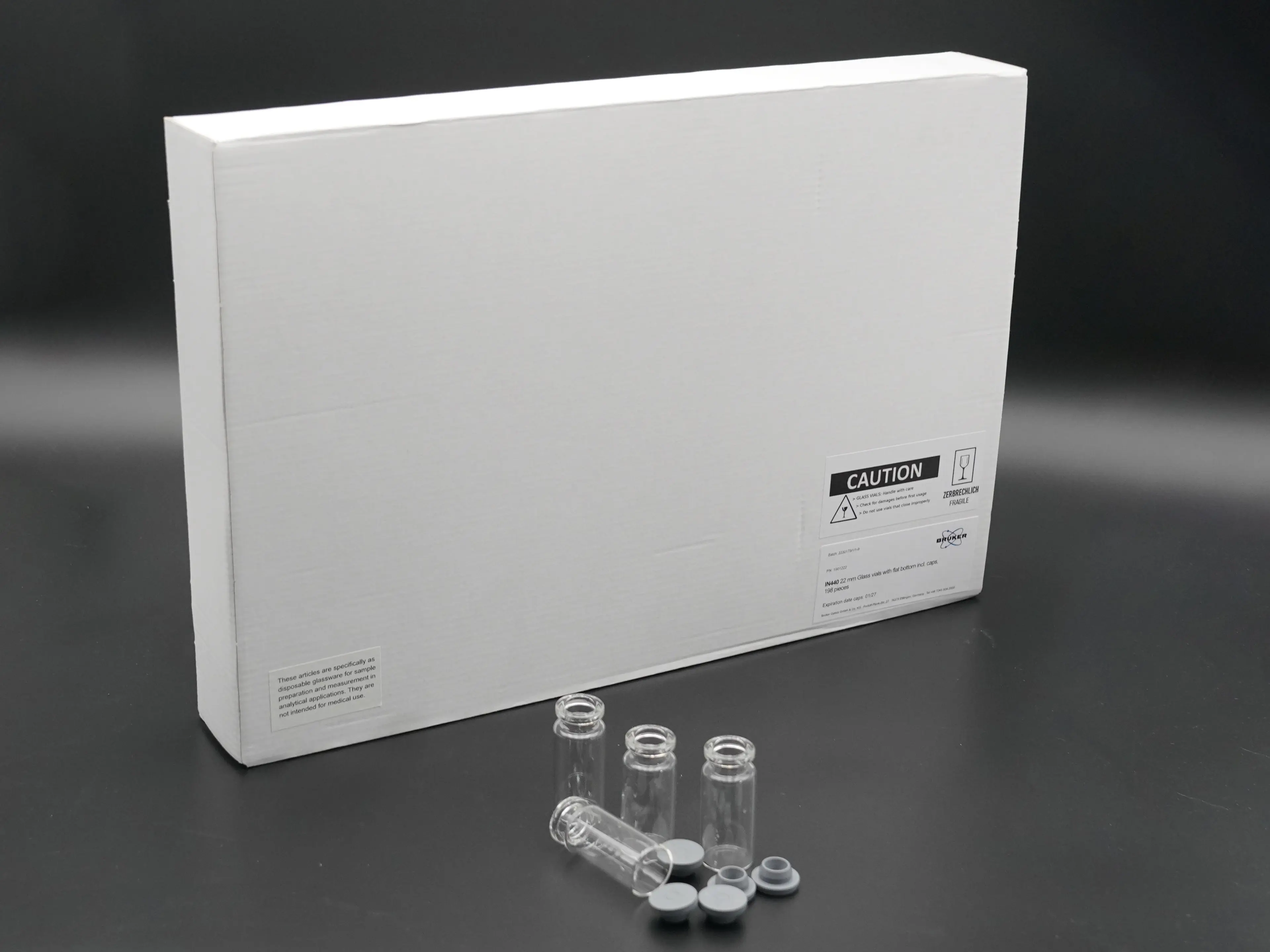 IN440-005: Glass vials with flat bottom, 990 pieces including caps, 22mm outer diameter,